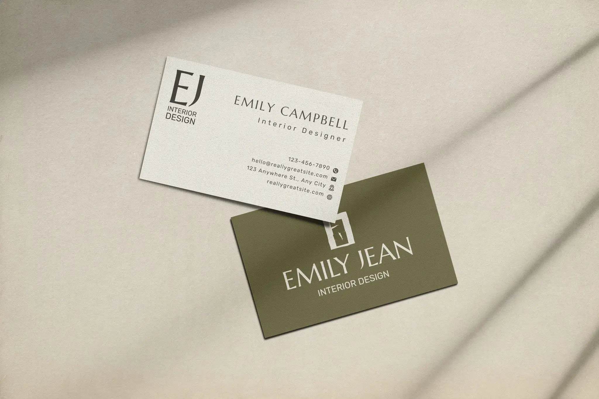 Emily Jean business cards: a cream card with Emily Campbell’s details and an olive card with the full logo